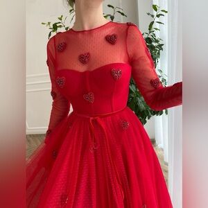 Teuta Matoshi Draped Heart Dress size 6 pristine condition 
Beautiful red